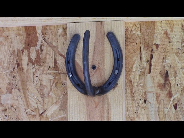 How to make a coat or towel hook out of horseshoes.