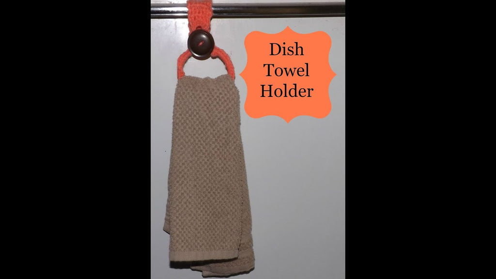 A crochet dish towel holder