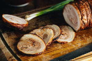 Make this easy, melt-in-mouth Chashu pork belly recipe at home! Braised in a sweet and savory sauce, you can now add the tender slice of meat as topping to your next bowl of ramen!